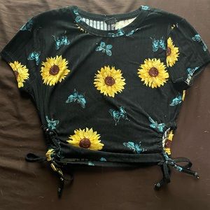Large black Rue 21 crop top with sunflowers and blue monarch butterflies